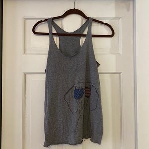 Grey racer back tank. Dog wearing American flag sunglasses.